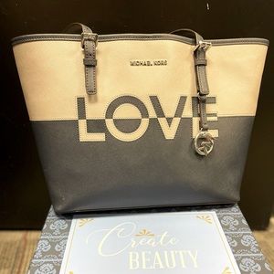 Blue and gray Michael Kors purse